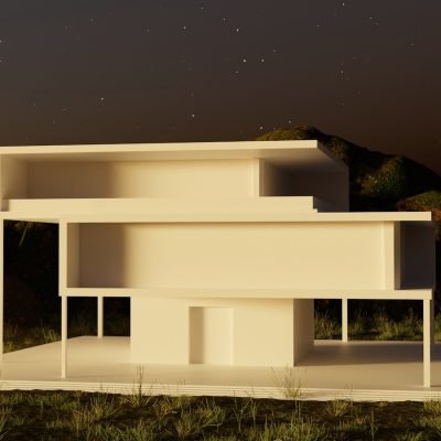 a white building sitting on top of a lush green field